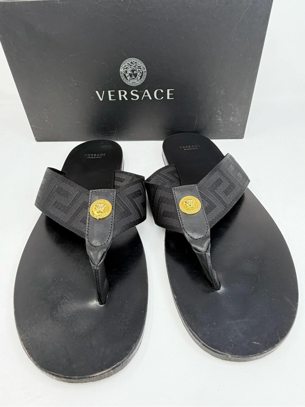 Versace Black Thong Sandals with Gold Medusa Accent